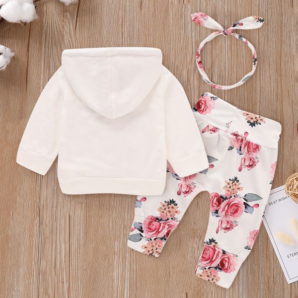 Conjunto para bebé 3 pie3zas sudadera, pantalón y banda de tela para el cabello color blanco con estampado floral